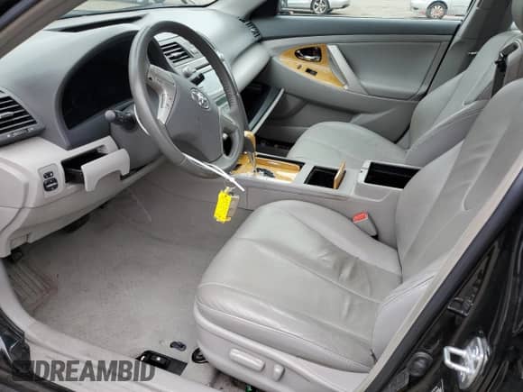 2007 Toyota Camry XLE с VIN 4T1BK46K37U543991, выставлен на аукционе Copart как лот 87474665 с пробегом 123 507 миль миль и Списание • Salvage title. История ставок и продаж доступна на DreamBid. Изображение 7.
