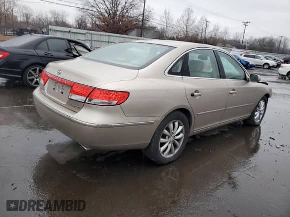 2006 Hyundai Azera SE с VIN KMHFC46FX6A089823, выставлен на аукционе Copart как лот 83678044 с пробегом 161 787 миль миль и Списание • Salvage title. История ставок и продаж доступна на DreamBid. Изображение 3.