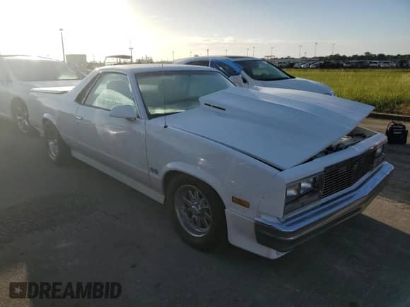 1986 Chevrolet El Camino SS с VIN 3GCCW80H9GS916596, выставлен на аукционе Copart как лот 74758864 с пробегом Не указан миль и Списание • Salvage title. История ставок и продаж доступна на DreamBid. Изображение 4.