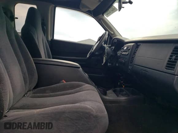 2003 Dodge Dakota с VIN 1D7HG12X13S196592, выставлен на аукционе Copart как лот 58576995 с пробегом 22 818 миль миль и Списание • Salvage title. История ставок и продаж доступна на DreamBid. Изображение 10.