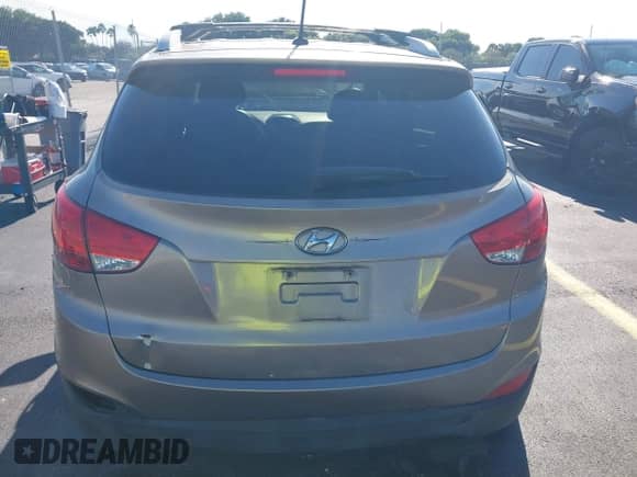 2013 Hyundai Tucson GLS with VIN KM8JU3AC0DU687400, listed as a IAAI auction lot 43191184 with 130,345 mi miles and . Bid and sale history available at DreamBid. Image 16.
