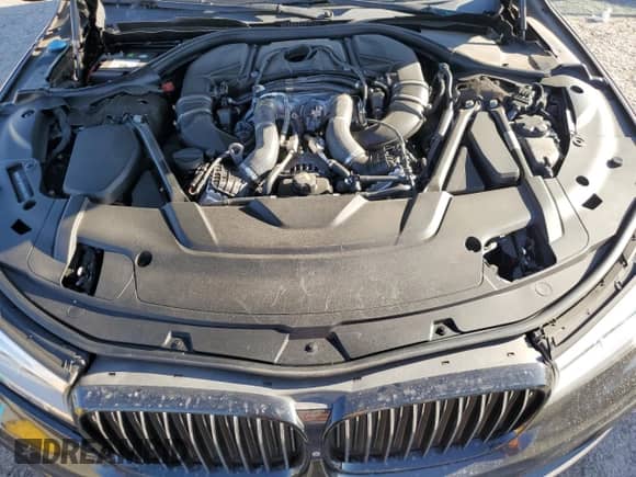 2016 BMW 7 Series 750i xDrive with VIN WBA7F2C5XGG415521, listed as a Copart auction lot 80483505 with 128,509 mi miles and Salvage title. Bid and sale history available at DreamBid. Image 11.