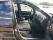 2015 Jeep Grand Cherokee SRT with VIN 1C4RJFDJ4FC853745, listed as a IAAI auction lot 43327828 with 68,614 mi miles and . Bid and sale history available at DreamBid. Image 5.