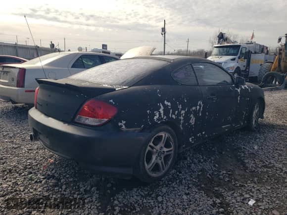 2006 Hyundai Tiburon GT with VIN KMHHN65F86U221847, listed as a Copart auction lot 42923865 with 188,494 mi miles and Salvage title. Bid and sale history available at DreamBid. Image 3.