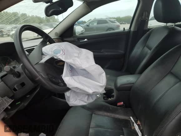 2012 Chevrolet Impala LTZ with VIN 2G1WC5E38C1316393, listed as a Copart auction lot 70455125 with 90,528 mi miles and Salvage title. Bid and sale history available at DreamBid. Image 7.