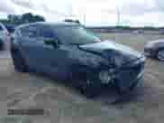 2023 Mazda CX-5 S Carbon Edition z VIN JM3KFBCM3P0262534, wystawiony jako IAAI lot #42740448 z przebiegiem 10 257 mil mil oraz . Historia ofert i sprzedaży dostępna na DreamBid. Obrazek 1.