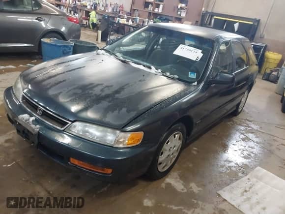 1997 Honda Accord with VIN 1HGCE1720VA005911, listed as a IAAI auction lot 41730124 with 239,883 mi miles and . Bid and sale history available at DreamBid. Image 2.