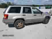 2004 Jeep Grand Cherokee Laredo with VIN 1J4GX48S64C302687, listed as a Copart auction lot 85599075 with 213,057 mi miles and Salvage title. Bid and sale history available at DreamBid. Image 3.