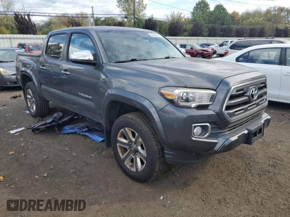 2017 Toyota Tacoma Limited with VIN 3TMGZ5AN1HM047851, listed as a Copart auction lot 82239165 with 127,129 mi miles and Clean title. Bid and sale history available at DreamBid. Image 4.