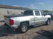 2014 Chevrolet Silverado 1500 LT with VIN 3GCUKREC0EG343333, listed as a IAAI auction lot 43328983 with 143,254 mi miles and . Bid and sale history available at DreamBid. Image 4.