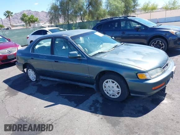 1997 Honda Accord Value z VIN 1HGCD5682VA171573, wystawiony jako IAAI lot #42238337 z przebiegiem 192 929 mil mil oraz . Historia ofert i sprzedaży dostępna na DreamBid. Obrazek 13.