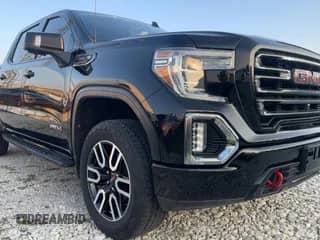 2021 GMC Sierra 1500 AT4 z VIN 3GTP9EEL5MG187421, wystawiony jako Copart lot #69324685 z przebiegiem 60 936 mil mil oraz Czysty tytuł • Clean title. Historia ofert i sprzedaży dostępna na DreamBid. Obrazek 1.