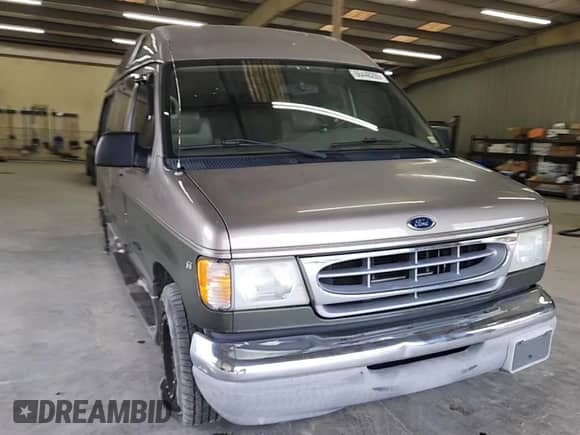 2002 Ford Econoline Cargo Recreational with VIN 1FDRE14L42HB76262, listed as a Copart auction lot 66448265 with 99,825 mi miles and Salvage title. Bid and sale history available at DreamBid. Image 14.