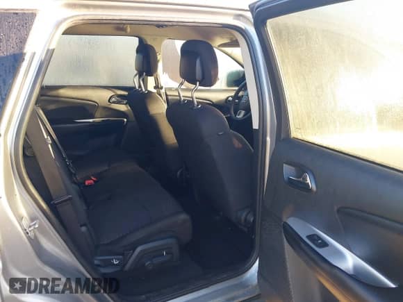 2016 Dodge Journey SE with VIN 3C4PDCAB0GT186088, listed as a IAAI auction lot 43329473 with 169,972 mi miles and . Bid and sale history available at DreamBid. Image 8.