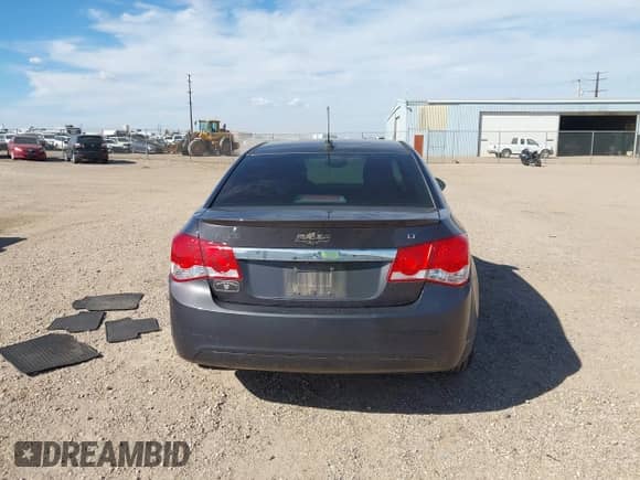 2016 Chevrolet Cruze LT z VIN 1G1PE5SB7G7183421, wystawiony jako IAAI lot #43298282 z przebiegiem 60 846 mil mil oraz . Historia ofert i sprzedaży dostępna na DreamBid. Obrazek 16.