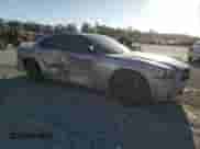 2014 Dodge Charger SXT with VIN 2C3CDXHG8EH364007, listed as a Copart auction lot 84805345 with 184,539 mi miles and Salvage title. Bid and sale history available at DreamBid. Image 4.