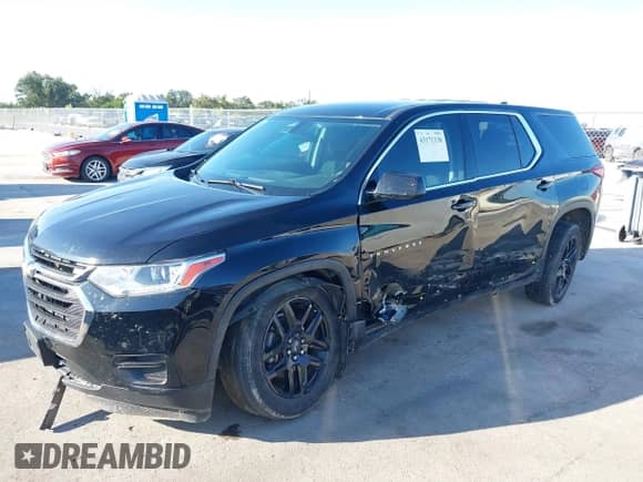 2020 Chevrolet Traverse LS with VIN 1GNERFKW4LJ173042, listed as a IAAI auction lot 43171338 with 80,691 mi miles and . Bid and sale history available at DreamBid. Image 6.