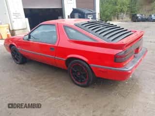 1989 Dodge Daytona z VIN 1B3XG24J5KG136306, wystawiony jako IAAI lot #42179601 z przebiegiem 131 083 mil mil oraz . Historia ofert i sprzedaży dostępna na DreamBid. Obrazek 3.