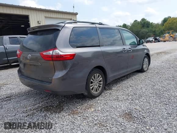 2015 Toyota Sienna XLE with VIN 5TDYK3DCXFS666338, listed as a IAAI auction lot 43282074 with 174,049 mi miles and . Bid and sale history available at DreamBid. Image 4.