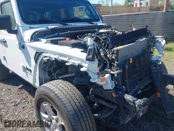 2022 Jeep Wrangler Unlimited Sport S z VIN 1C4HJXDG5NW254016, wystawiony jako IAAI lot #42214730 z przebiegiem 42 003 mil mil oraz . Historia ofert i sprzedaży dostępna na DreamBid. Obrazek 18.