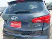 2015 Hyundai Santa Fe with VIN 5XYZT3LB0FG257577, listed as a IAAI auction lot 43133881 with Not provided miles and . Bid and sale history available at DreamBid. Image 16.
