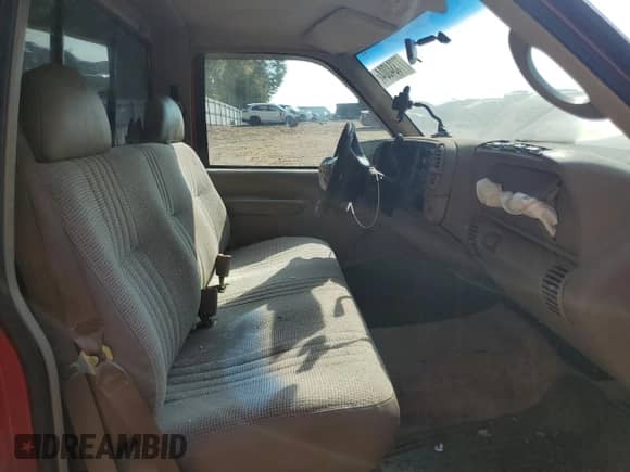 1998 GMC Sierra 1500 z VIN 1GTEC14MXWZ552139, wystawiony jako Copart lot #77334004 z przebiegiem 264 407 mil mil oraz Szkoda całkowita • Salvage title. Historia ofert i sprzedaży dostępna na DreamBid. Obrazek 11.