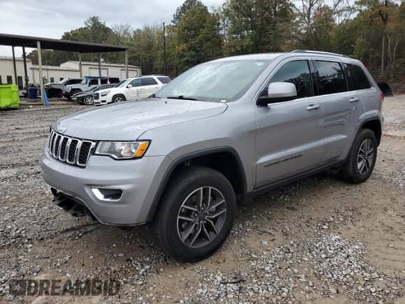 2019 Jeep Grand Cherokee Laredo E with VIN 1C4RJEAG6KC850875, listed as a Copart auction lot 79020264 with 168,261 mi miles and Salvage title. Bid and sale history available at DreamBid. Image 1.