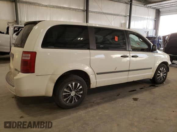 2010 Dodge Grand Caravan Cargo with VIN 2D4CN1AE5AR265778, listed as a Copart auction lot 85773554 with Not provided miles and Salvage title. Bid and sale history available at DreamBid. Image 3.
