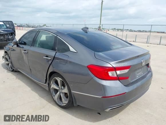 2018 Honda Accord Touring with VIN 1HGCV2F93JA024791, listed as a IAAI auction lot 42419831 with 153,836 mi miles and . Bid and sale history available at DreamBid. Image 3.