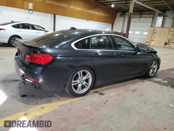2017 BMW 4 Series 430i xDrive with VIN WBA4F9C58HG792099, listed as a Copart auction lot 87906175 with 144,097 mi miles and Salvage title. Bid and sale history available at DreamBid. Image 3.