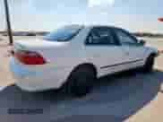 1999 Honda Accord LX z VIN 1HGCG5640XA121200, wystawiony jako Copart lot #70757615 z przebiegiem 240 754 mil mil oraz Szkoda całkowita • Salvage title. Historia ofert i sprzedaży dostępna na DreamBid. Obrazek 3.