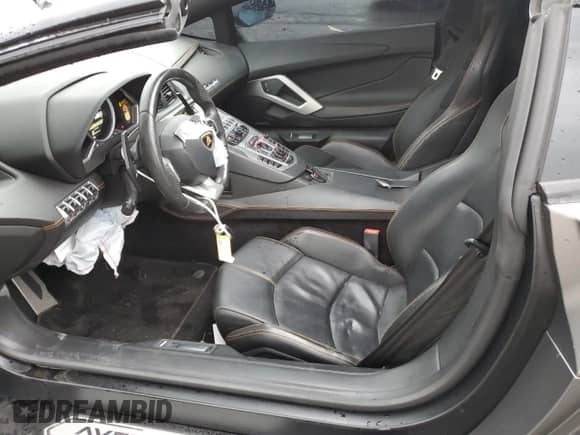 2014 Lamborghini Aventador с VIN ZHWUR1ZD6ELA03035, выставлен на аукционе Copart как лот 66784084 с пробегом 23 771 миль миль и Списание • Salvage title. История ставок и продаж доступна на DreamBid. Изображение 7.