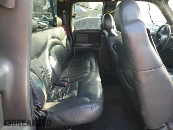 2002 GMC Sierra 1500 SLE с VIN 1GTEC19T32E124432, выставлен на аукционе Copart как лот 83583374 с пробегом Не указан миль и Списание • Salvage title. История ставок и продаж доступна на DreamBid. Изображение 10.