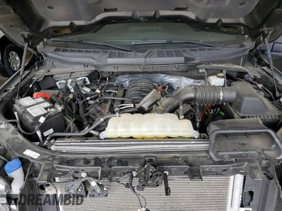 2023 Ford F-150 XL with VIN 1FTFW1E58PKG09418, listed as a Copart auction lot 57287655 with 32,945 mi miles and Salvage title. Bid and sale history available at DreamBid. Image 11.