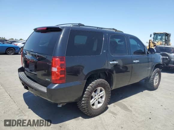 2011 Chevrolet Tahoe LT с VIN 1GNSCBE07BR244254, выставлен на аукционе Copart как лот 63304145 с пробегом 198 882 миль миль и Списание • Salvage title. История ставок и продаж доступна на DreamBid. Изображение 3.