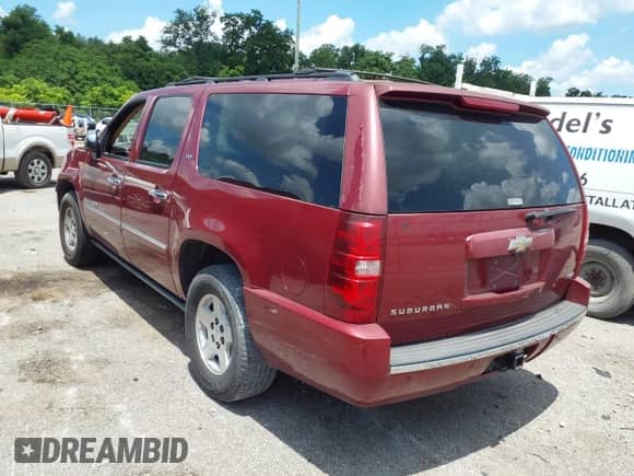 2009 Chevrolet Suburban LTZ z VIN 1GNFK36379J124126, wystawiony jako IAAI lot #42564602 z przebiegiem 210 343 mil mil oraz . Historia ofert i sprzedaży dostępna na DreamBid. Obrazek 3.