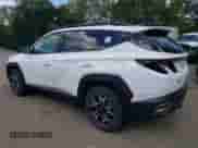 2025 Hyundai Tucson SEL with VIN 5NMJFCDE1SH497492, listed as a Copart auction lot 70523465 with 18 mi miles and Salvage title. Bid and sale history available at DreamBid. Image 2.