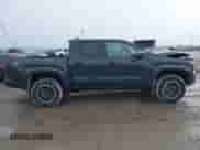 2024 Toyota Tacoma SR5 with VIN 3TMLB5JNXRM055645, listed as a IAAI auction lot 41208771 with 984 mi miles and . Bid and sale history available at DreamBid. Image 14.