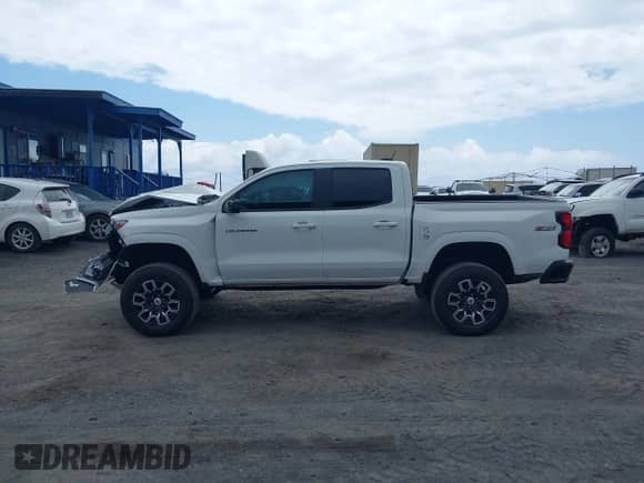 2023 Chevrolet Colorado 4WD Z71 with VIN 1GCPTDEK9P1219177, listed as a IAAI auction lot 42226373 with 26,238 mi miles and . Bid and sale history available at DreamBid. Image 14.
