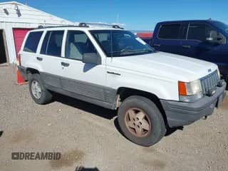 1995 Jeep Grand Cherokee Laredo with VIN 1J4GZ58Y6SC737646, listed as a IAAI auction lot 43286723 with 212,936 mi miles and . Bid and sale history available at DreamBid. Image 1.