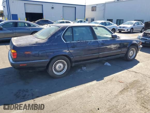 1994 BMW 7 Series with VIN WBAGD8322RDE92891, listed as a Copart auction lot 82638705 with 194,269 mi miles and Clean title. Bid and sale history available at DreamBid. Image 3.