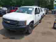 2014 Chevrolet Tahoe Commercial with VIN 1GNLC2E07ER228838, listed as a IAAI auction lot 42410417 with 140,342 mi miles and . Bid and sale history available at DreamBid. Image 18.