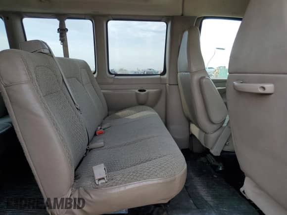 2009 Chevrolet Express Passenger с VIN 1GAHG39K691162400, выставлен на аукционе Copart как лот 69941455 с пробегом 93 557 миль миль и Списание • Salvage title. История ставок и продаж доступна на DreamBid. Изображение 11.