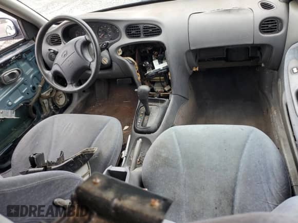 2000 Hyundai Elantra с VIN KMHJW35F5YU154687, выставлен на аукционе Copart как лот 54689874 с пробегом 253 055 миль миль и Списание • Salvage title. История ставок и продаж доступна на DreamBid. Изображение 8.