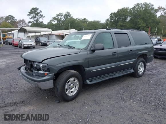 2002 Chevrolet Suburban LT z VIN 3GNEC16Z02G255908, wystawiony jako IAAI lot #43558187 z przebiegiem 294 984 mil mil oraz . Historia ofert i sprzedaży dostępna na DreamBid. Obrazek 2.