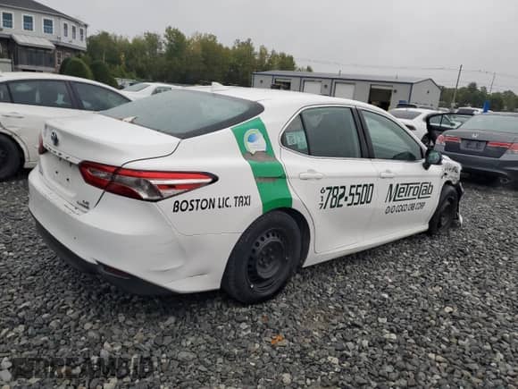 2019 Toyota Camry Hybrid LE с VIN 4T1B31HK6KU006792, выставлен на аукционе Copart как лот 82053925 с пробегом 207 698 миль миль и Списание • Salvage title. История ставок и продаж доступна на DreamBid. Изображение 3.