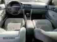 1996 Honda Accord LX z VIN 1HGCD5639TA015189, wystawiony jako Copart lot #70016855 z przebiegiem 223 903 mil mil oraz Szkoda całkowita • Salvage title. Historia ofert i sprzedaży dostępna na DreamBid. Obrazek 8.