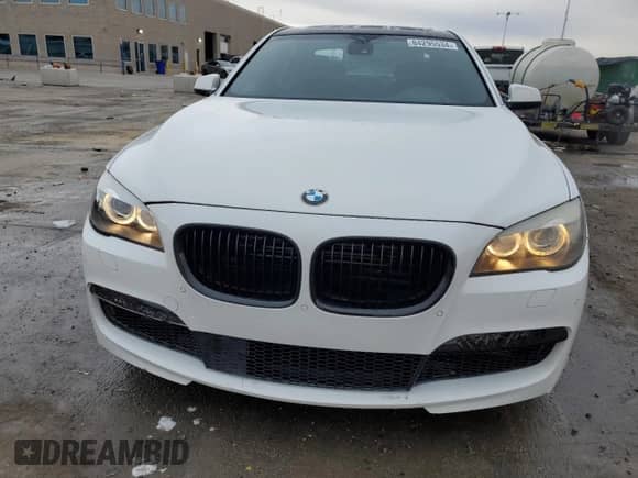 2012 BMW 7 Series 750i xDrive с VIN WBAKC6C5XCC396061, выставлен на аукционе Copart как лот 84295534 с пробегом 107 908 миль миль и Чистый • Clean title. История ставок и продаж доступна на DreamBid. Изображение 5.
