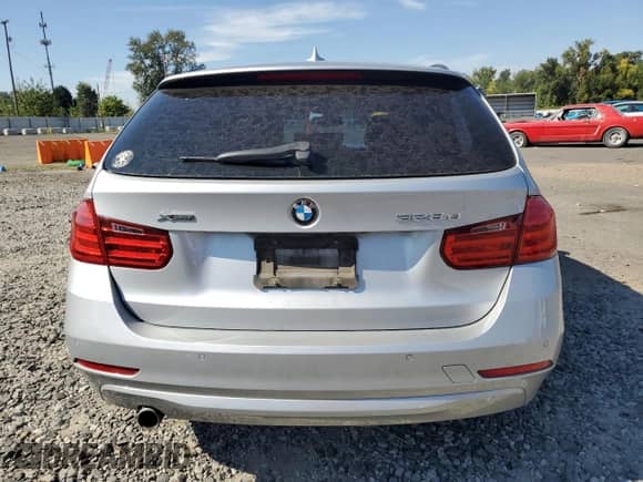 2014 BMW 3 Series 328d xDrive with VIN WBA3K5C51EK300277, listed as a Copart auction lot 70952595 with 125,873 mi miles and Salvage title. Bid and sale history available at DreamBid. Image 6.