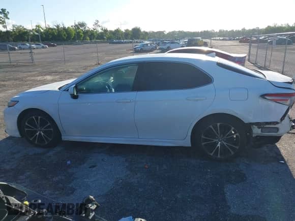 2019 Toyota Camry LE с VIN 4T1B11HKXKU794532, выставлен на аукционе IAAI как лот 43224157 с пробегом 80 828 миль миль и . История ставок и продаж доступна на DreamBid. Изображение 14.